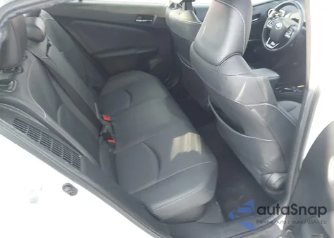 2021 Toyota Prius Prime Limited z USA, uszkodzony, nr VIN JTDKAMFP6M3174953